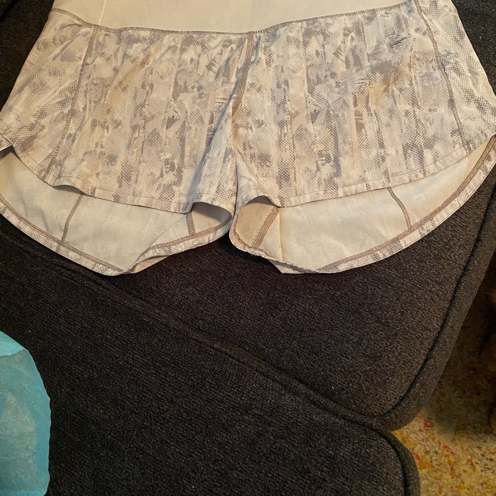 Lululemon size 6. Grey- white speed ups